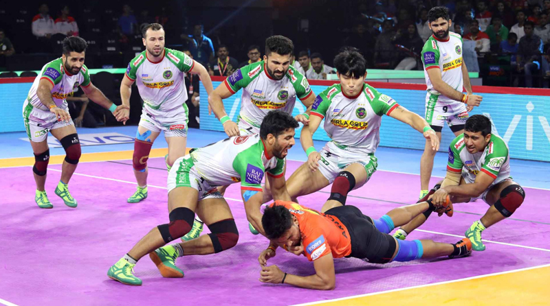 Players in action during Pro Kabaddi League in Ahmedabad on Friday. Players in action during Pro Kabaddi League in Ahmedabad on Friday.