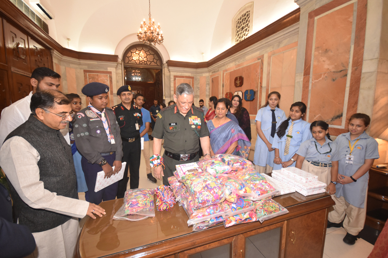 School children presenting Rakhis to Army Chief in presence of Tarun Vijay and others. School children presenting Rakhis to Army Chief in presence of Tarun Vijay and others.