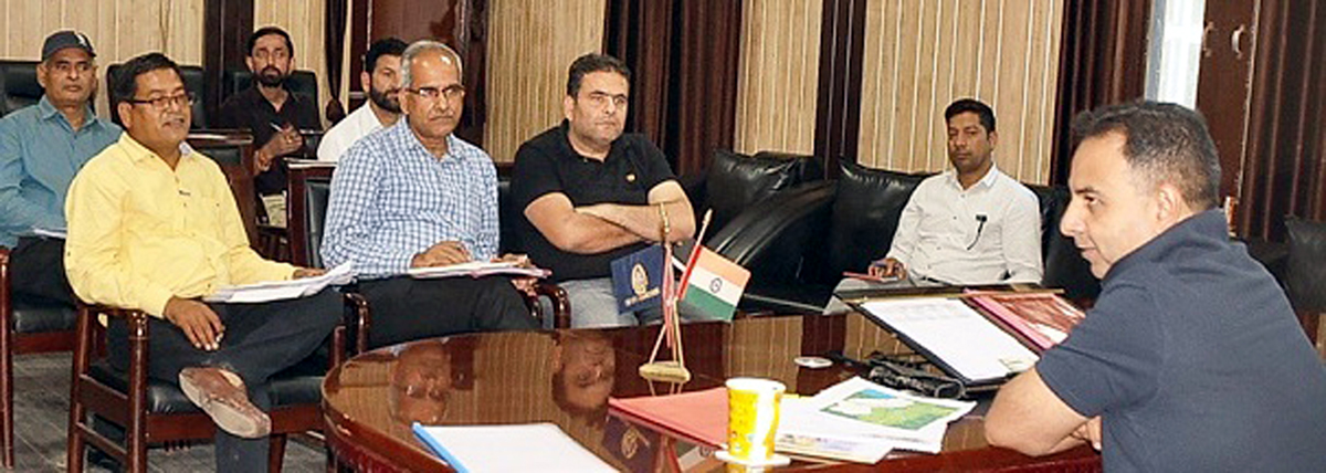 DDC Nazim Zai Khan chairing a meeting at Ramban on Sunday. DDC Nazim Zai Khan chairing a meeting at Ramban on Sunday.