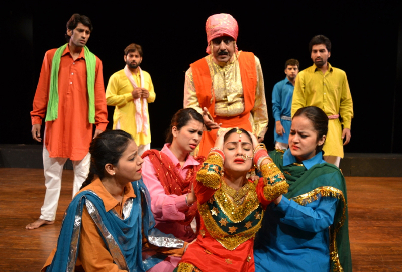 A scene from Dogri play ‘Ghumayee’. A scene from Dogri play ‘Ghumayee’.