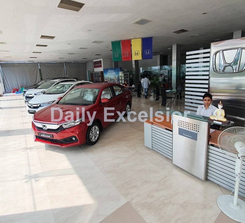 Cars displayed for sale at a showroom in Jammu. Excelsior/Rakesh