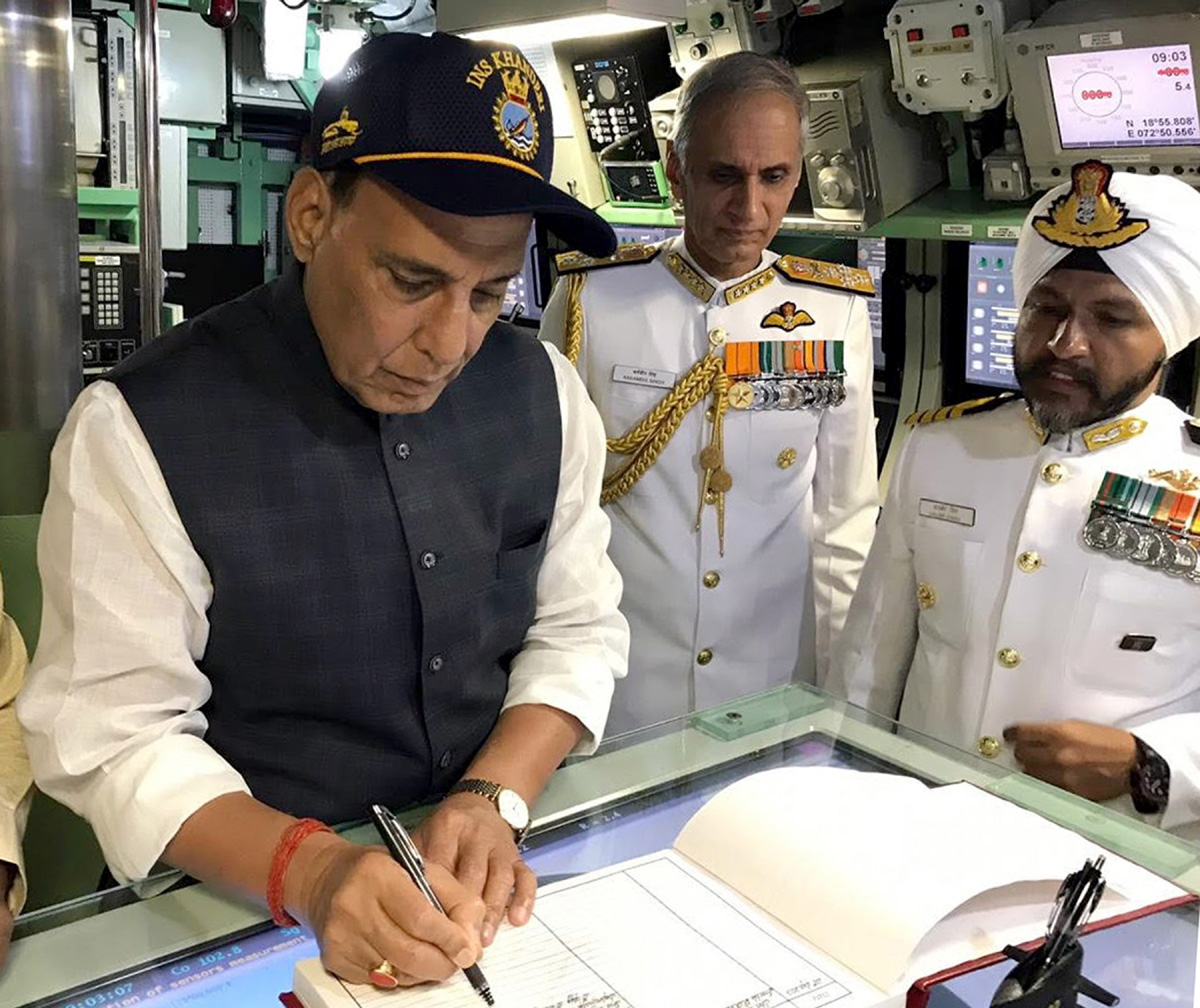 Minister for Defence, Rajnath Singh signing the visitor’s book of INS Khanderi, at Naval Dockyard, in Mumbai on Saturday. Minister for Defence, Rajnath Singh signing the visitor’s book of INS Khanderi, at Naval Dockyard, in Mumbai on Saturday.