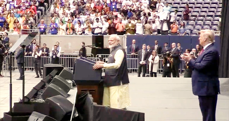 US President Donald Trump claps as Prime Minister Narendra Modi addresses ‘ Howdy Modi’ event at Houston in United States on Sunday. US President Donald Trump claps as Prime Minister Narendra Modi addresses ‘ Howdy Modi’ event at Houston in United States on Sunday.