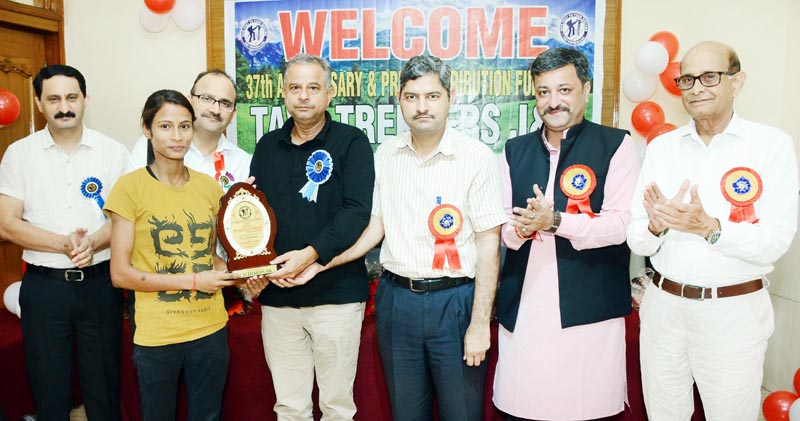 Shivani Charak, the top ranked woman climber of India, being honoured at a function in Jammu. Shivani Charak, the top ranked woman climber of India, being honoured at a function in Jammu.