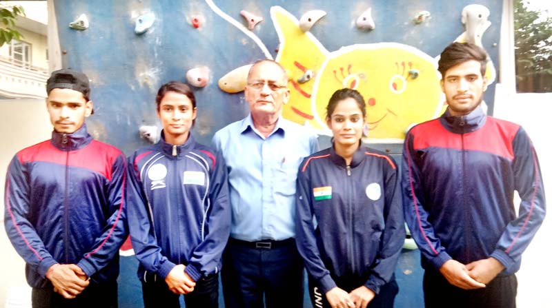 Selected sport climbers posing for group photograph. Selected sport climbers posing for group photograph.