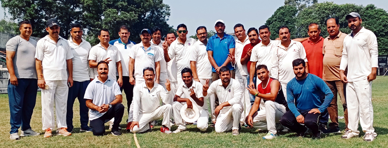 Players of JU Employees Cricket team and JKP-XI posing for group photograph. Players of JU Employees Cricket team and JKP-XI posing for group photograph.
