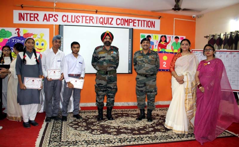 Winners of Quiz Competition and dignitaries posing for a group photograph. Winners of Quiz Competition and dignitaries posing for a group photograph.