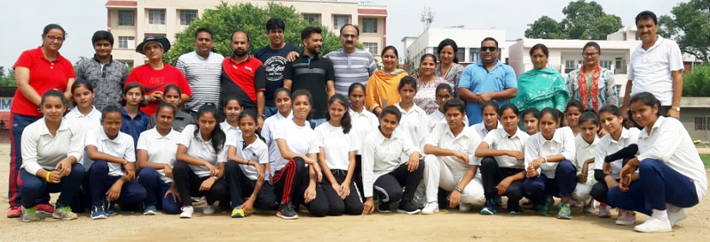 Under-19 girls teams posing along with officers and officials at Parade ground in Jammu. Under-19 girls teams posing along with officers and officials at Parade ground in Jammu.