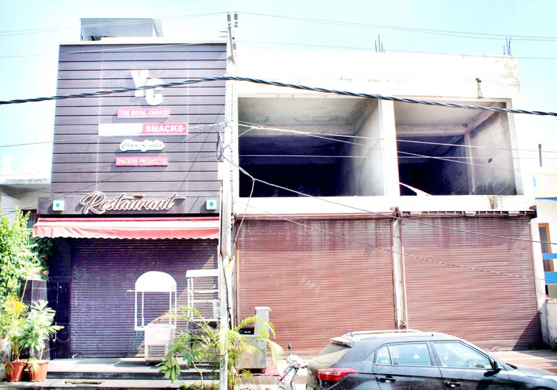 Illegal shops sealed by JMC in Gandhi Nagar area. Illegal shops sealed by JMC in Gandhi Nagar area.