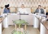 Advisor Farooq Khan chairing a meeting at Srinagar on Monday.
