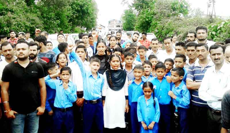 Students and villagers protesting against shortage of teachers at Govt High School Deot. Students and villagers protesting against shortage of teachers at Govt High School Deot.