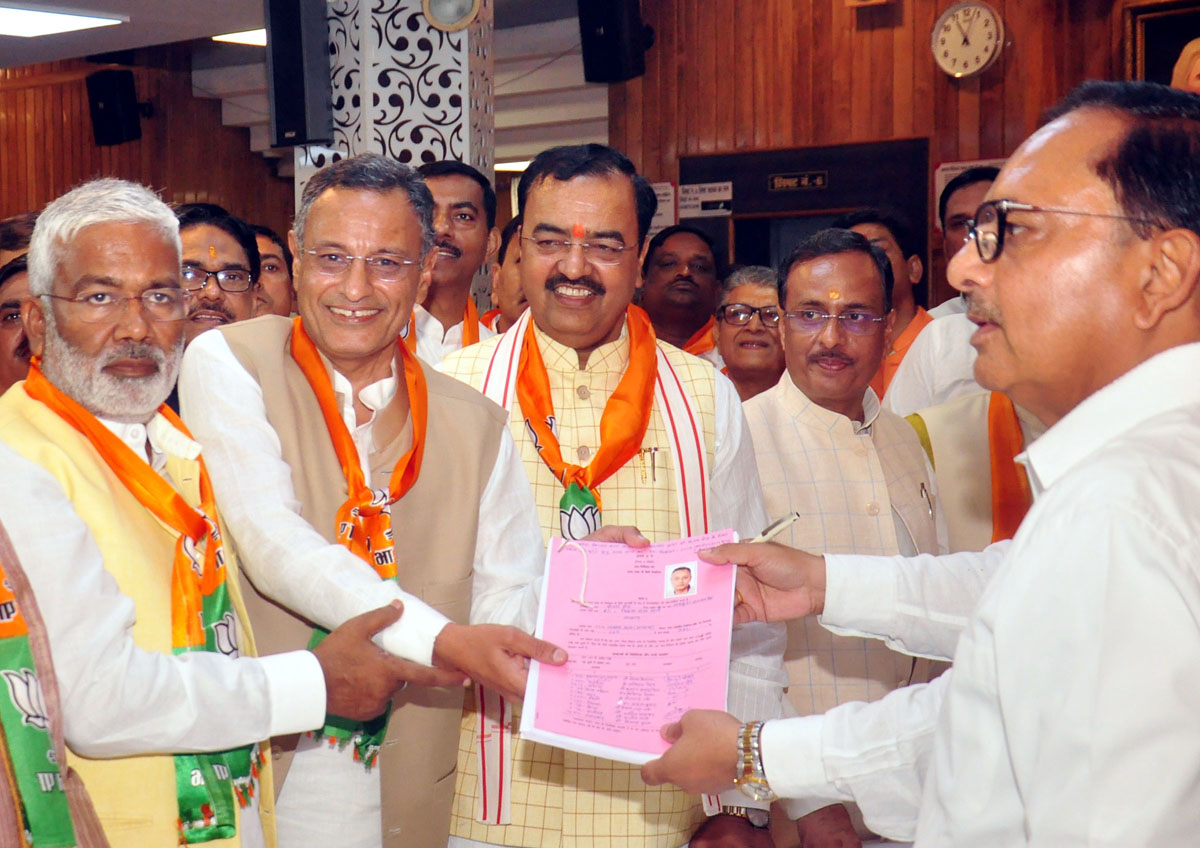 Sanjay Seth filing his nomination papers for Rajya Sabha in presence of BJP state president Swatantra Dev Singh, Deputy CM K P Maurya and Dinesh Sharama at Vidhan Sabha in Lucknow on Thursday. (UNI) Sanjay Seth filing his nomination papers for Rajya Sabha in presence of BJP state president Swatantra Dev Singh, Deputy CM K P Maurya and Dinesh Sharama at Vidhan Sabha in Lucknow on Thursday. (UNI)
