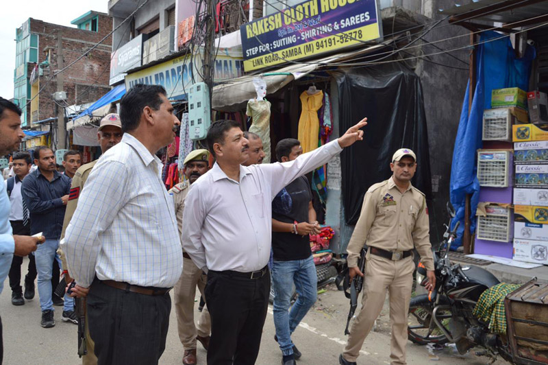 DC Samba, Rohit Khajuria during visit to market on Saturday. DC Samba, Rohit Khajuria during visit to market on Saturday.