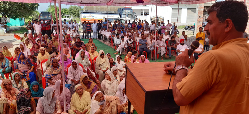 MP, Jugal Kishore Sharma addressing a public meeting at village Phinder in R S Pura on Saturday. MP, Jugal Kishore Sharma addressing a public meeting at village Phinder in R S Pura on Saturday.