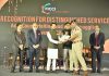 SP City North Jammu Amritpal Singh receiving Certificate of Recognition from members of FICCI.