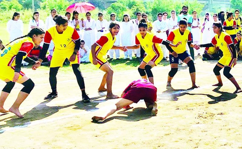 Players in action during a Kabaddi Tournament organised by Cluster University of Jammu on Tuesday. Players in action during a Kabaddi Tournament organised by Cluster University of Jammu on Tuesday.