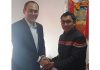 Commissioner Secretary Rigzin Samphel and MP Ladakh Jamyang Tsering Namgyal posing for photograph after meeting at Leh.