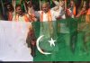 Dogra Front activists torching Pak flag during a protest in Jammu on Wednesday.