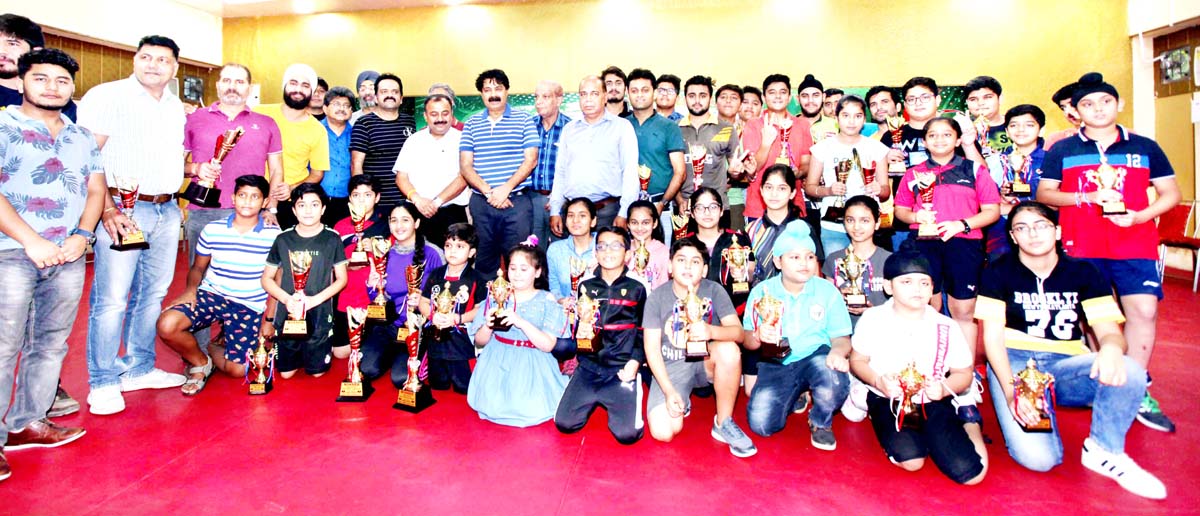 Winners of Jammu District Open Table Tennis Championship posing along with dignitaries and officials during closing ceremony in Jammu on Saturday. -Excelsior/Rakesh Winners of Jammu District Open Table Tennis Championship posing along with dignitaries and officials during closing ceremony in Jammu on Saturday. -Excelsior/Rakesh