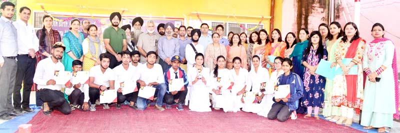 Winners of contest and participants with staff members of GDC Bishnah. Winners of contest and participants with staff members of GDC Bishnah.