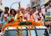 Union Minister Dr Jitendra Singh, flanked by party candidate Mool Chand Sharma and MoS Krishan Pal Gurjar, at a BJP election rally in Ballabgarh, Haryana on Friday.