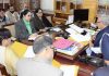 Advisor Farooq Khan chairing a meeting on Wednesday.