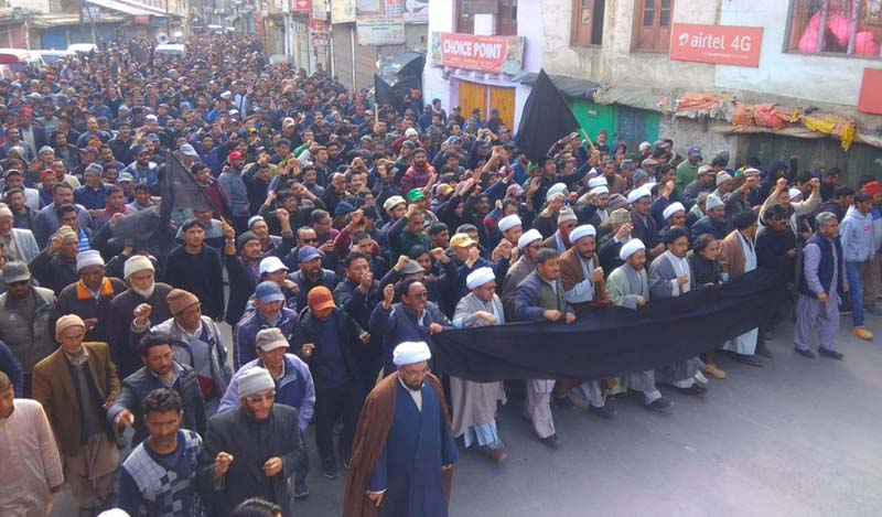 Joint Action Committee taking out protest march in Kargil on Thursday. —Excelsior/Basharat Ladakhi Joint Action Committee taking out protest march in Kargil on Thursday. —Excelsior/Basharat Ladakhi