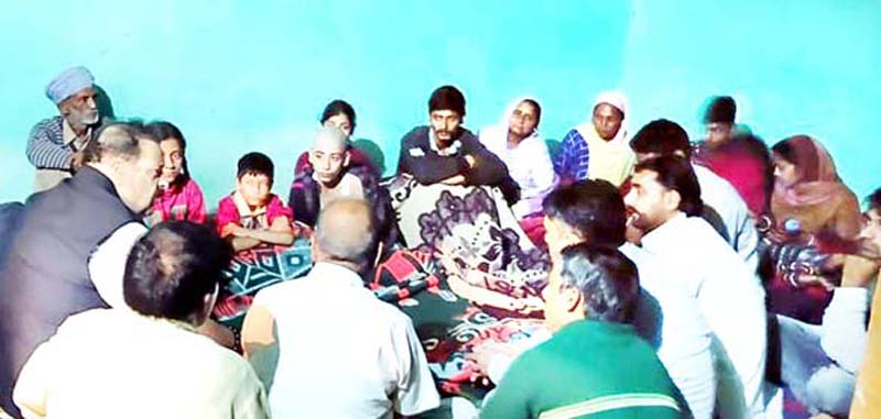 National Conference Provincial President Devender Singh Rana meeting relatives of slain truck driver on Tuesday. National Conference Provincial President Devender Singh Rana meeting relatives of slain truck driver on Tuesday.