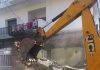 JMC demolishing illegally raised structure in Jammu on Wednesday.