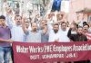 PHE workers staging protest at PHE complex, Udhampur.