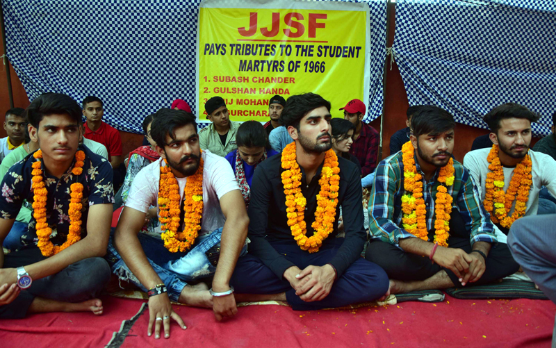 Members of JJSF sitting on fast at Shaheedi Sathal outside GGM Science College Jammu on Wednesday. -Excelsior/Rakesh Members of JJSF sitting on fast at Shaheedi Sathal outside GGM Science College Jammu on Wednesday. -Excelsior/Rakesh