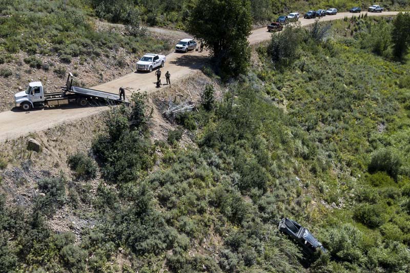 2 killed as car rolls down