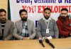 Jammu and Kashmir Khidmat Centre Association addressing a press conference in Srinagar. -Excelsior/Shakeel
