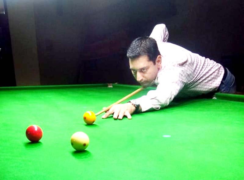 Cueist Sohail Khalid aiming at target during final match in Senior Billiards at Billiards Hall, MA Stadium, Jammu on Saturday. -Excelsior/Rakesh Cueist Sohail Khalid aiming at target during final match in Senior Billiards at Billiards Hall, MA Stadium, Jammu on Saturday. -Excelsior/Rakesh