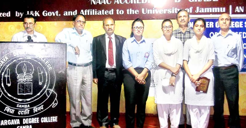 Dignitaries posing alongwith students at Samba. Dignitaries posing alongwith students at Samba.