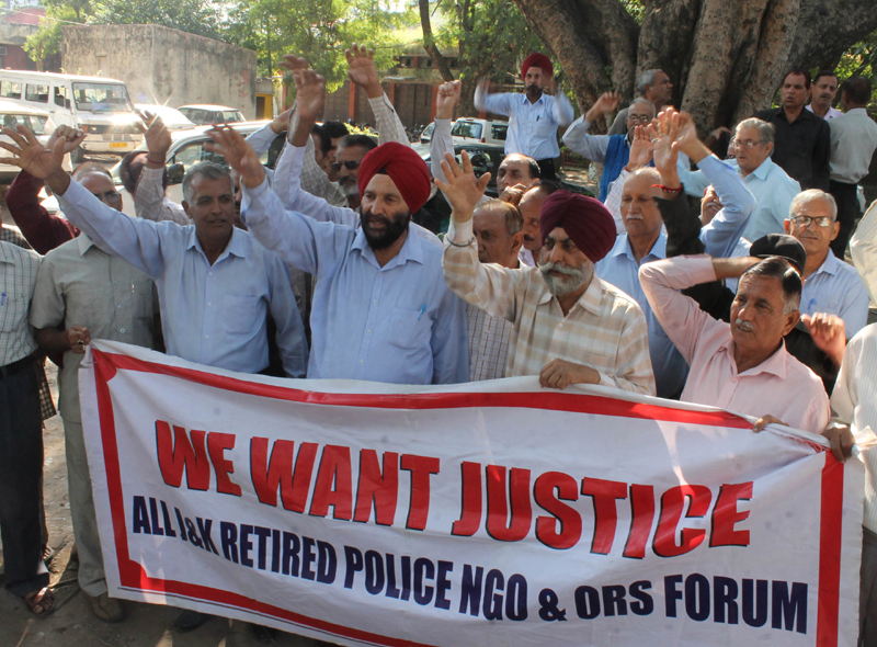 Retired police personnel during a protest at Jammu on Tuesday. Retired police personnel during a protest at Jammu on Tuesday.