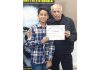 Young artist of Natrang Jammu, Abir Beri, receiving certificate from filmmaker Mahesh Bhatt in Mumbai.