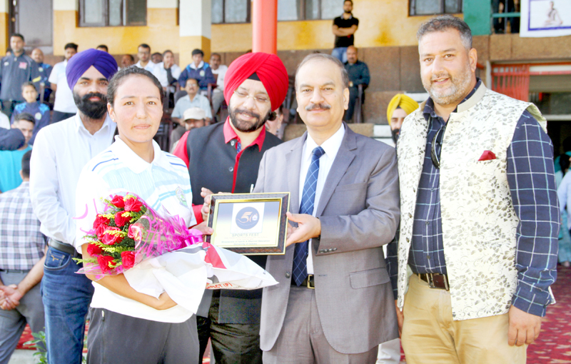 Vice Chancellor JU, Prof Manoj Dhar honouring Tsetan Dolma in Jammu on Thursday. Vice Chancellor JU, Prof Manoj Dhar honouring Tsetan Dolma in Jammu on Thursday.