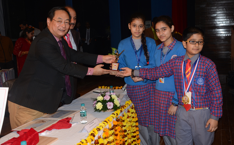 PD Tshering, CPMG J&K Circle awarding students of Navyug Hr Sec School, Jammu on Thursday. PD Tshering, CPMG J&K Circle awarding students of Navyug Hr Sec School, Jammu on Thursday.