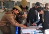 DLSA Udhampur team checking records of FIRs at a police station.