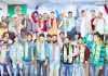 Sarpanchs and Panchs posing for a photograph with BJP State chief, Ravinder Raina at Jammu on Saturday.