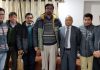 BJP delegation from Kargil posing with Lt. Governor of Ladakh R.K. Mathur at Leh on Sunday. —Excelsior/Basharat Ladakhi