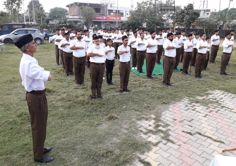 RSS activists during a parade on Sunday. RSS activists during a parade on Sunday.