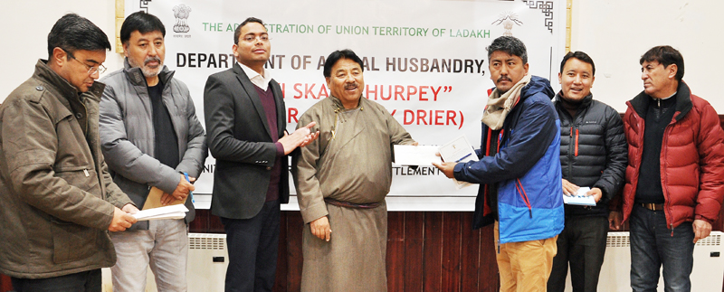 CEC Leh and DC Leh distributing solar churpey drier. CEC Leh and DC Leh distributing solar churpey drier.