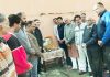 Political leaders and prominent citizens paying tributes to martyrs at Rajouri on Monday.