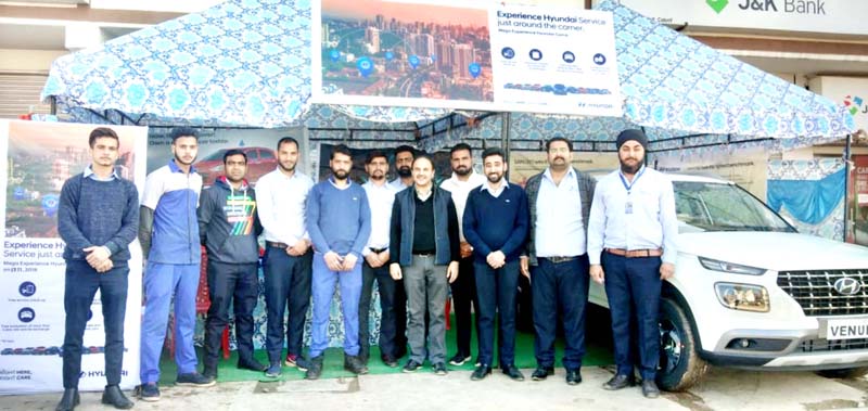 Officials of HMIL and Devika Hyundai posing during 'Experience Hyundai' camp. Officials of HMIL and Devika Hyundai posing during 'Experience Hyundai' camp.