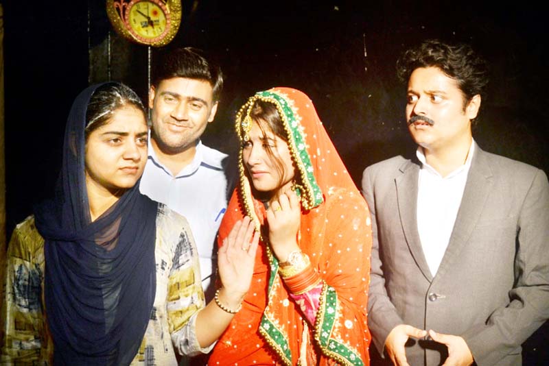 A scene from the play 'Ladai' staged at Jammu on Sunday. A scene from the play 'Ladai' staged at Jammu on Sunday.