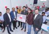 Ajit Patnaik, GM Tailoring Head along with other company officials inaugurating Raymond authorized tailoring hub in Jammu.