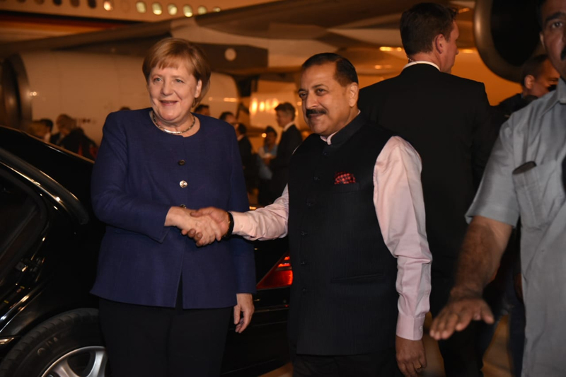 German Chancellor Dr Angela Merkel being received at the airport, on the behalf of the Modi Government, by Union Minister Dr Jitendra Singh, at New Delhi, late evening on Thursday. German Chancellor Dr Angela Merkel being received at the airport, on the behalf of the Modi Government, by Union Minister Dr Jitendra Singh, at New Delhi, late evening on Thursday.