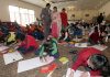 Children showing their skills during a painting competition at Kamala Palace, Jammu. -Excelsior/Rakesh